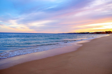 Fototapeta na wymiar Beautiful seascape on the sunset in Algarve, Portugal.