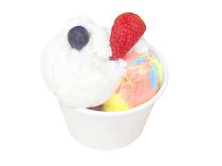 isolated white lemon and rainbow milk ice cream in white paper bowl on white background, blue berry and strawberry on top