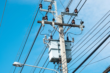 Messy electrical cables in thailand - many lines of cables chaotic set of interwoven, optical fiber technology open air outdoors.