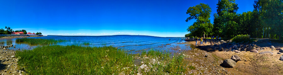 Fototapeta na wymiar river panorama against the blue sky