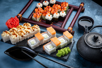 Big set of traditional delicious sushi rolls
