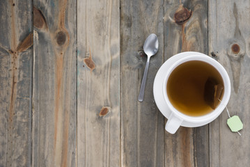 Top view cup of tea on wooden table