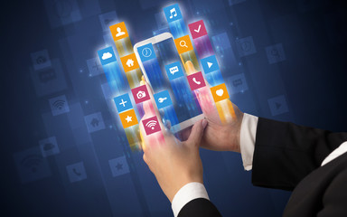 Female hand using smartphone with colorful angular fast switching application icons around