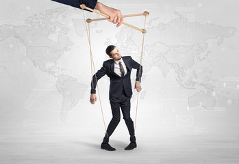 Puppet man with big city great power concept
