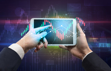 Hand touching tablet with worldwide reports links and statistics concept
