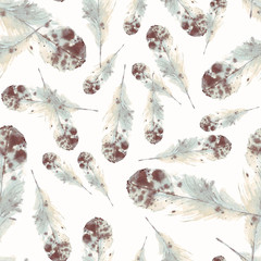 Seamless pattern of feathers in watercolor style.