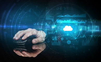 Hand using wireless mouse with cloud technology concept and dark background