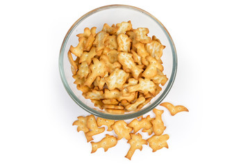 Top view of salty crackers various forms in glass bowl