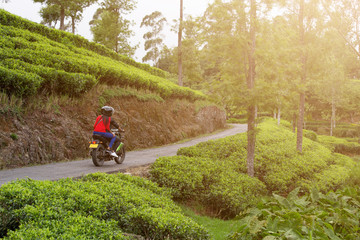 Obraz premium Couple of travelers on a motorcycle