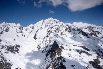 Fototapeta na wymiar late spring snow on Ortles Cevedale peak range, Alps, Italy