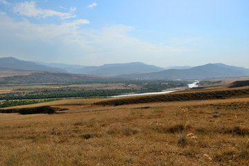 Fototapeta na wymiar Beautiful landscape with mountains and river, Georgia