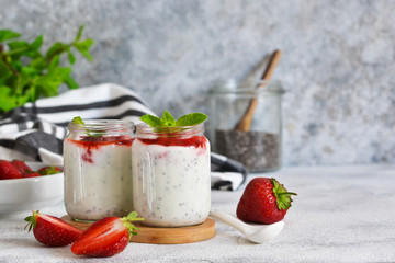 Yogurt with chia seeds and strawberries for breakfast. Good morning.
