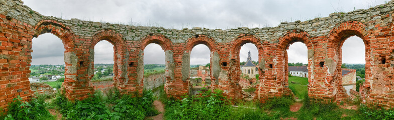 Fototapeta na wymiar Courtyard of mediaeval Medzhybizh fortress, panoramic view from tower. Ukraine