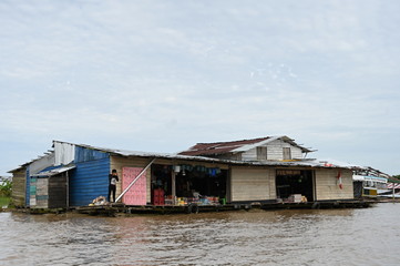 Fototapeta na wymiar Floating store on Amazon river near Colombian / Peruvian border
