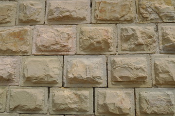 Fototapeta premium Mur de pierres avec bordures polies.