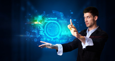 Man touching hologram screen displaying medical symbols and charts
