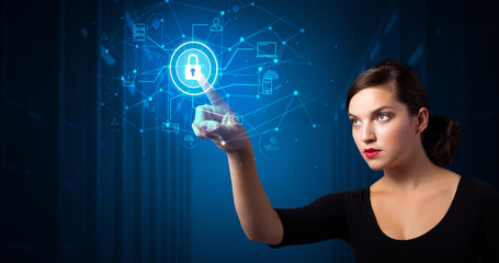 Woman touching hologram projection displaying cloud system 

