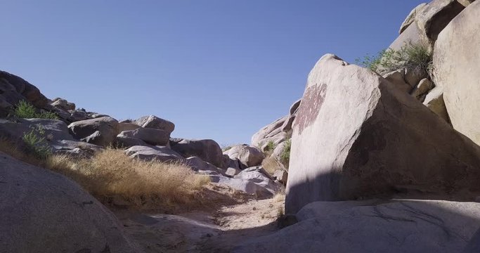 Low angle shot of rocks and boulders at Coyote Hole in Joshua Tree National Park, California, well known for it's old historical geoglyphs and pictographs made by Native Americans long ago.