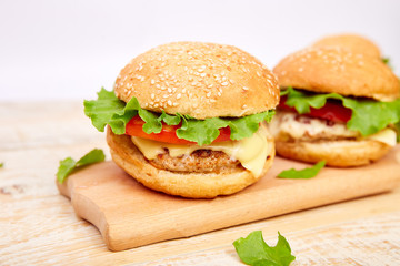 Craft beef burger  on wooden table on light background