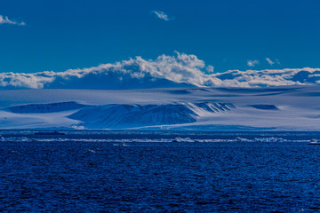 Fototapeta na wymiar norway landscape ice nature of the glacier mountains of Spitsbergen Longyearbyen Svalbard arctic ocean winter polar day sunset sky