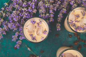 Summer drink iced coffee with lavender in glass