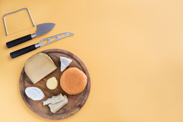 Assortment of quality cheese in background