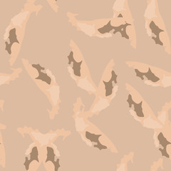 Sand camouflage of various shades of beige and brown colors