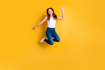 Full length body size view photo of lovely nice cute millennial have travel summer holiday rest relax laugh laughter she her dressed white top modern clothes isolated yellow bright background