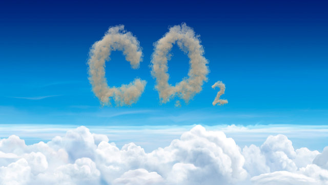 CO2 atmospheric pollution concept with dirty brown clouds spelling CO2 above a layer of pristine white clouds in a blue sky conceptual of emissions causing global warming