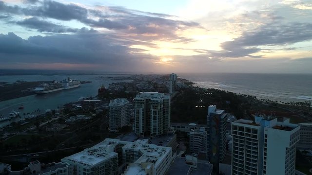 Old San Juan in the back ground as Condado is revealed during a Sunset