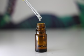  65 / 10000 АНГЛИЙСКИЙ Перевести вGoogleBing pipette with oil drop from a jar...