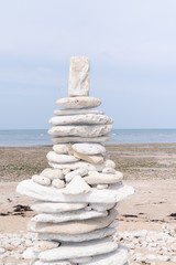Isle de Re stones balance tower on atlantic beach