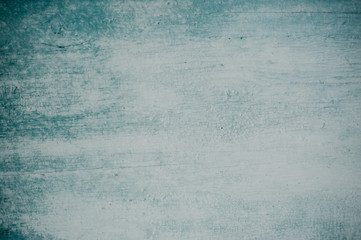 Blue painted wooden surface. Aged and shabby blue wooden texture or closeup background.