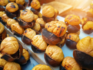 roasted sweet chestnuts on counter on street