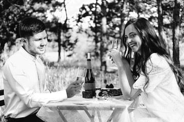 Couple of lovers celebrating their engagement at the dinner table