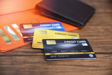 credit card in wallet on the wooden table