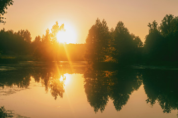 Sunset or sunrise over the lake