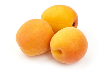 Fresh sweet apricot fruits, close-up, isolated on white background