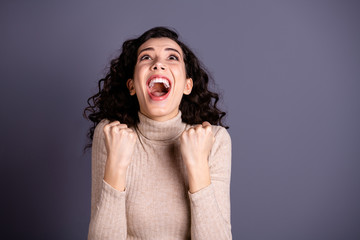 Close up photo beautiful she her lady ecstatic hands arms fists raised wild roar yell glad loud...