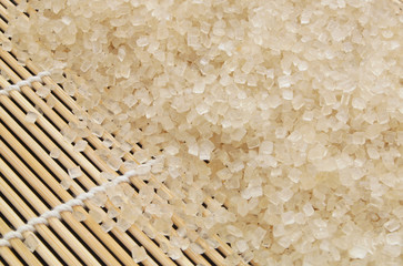 Sugar on bamboo background