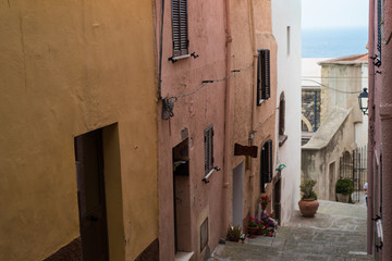Fototapeta na wymiar Narrow street in old town of Sardinia italy