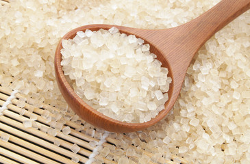 Wooden spoon and sugar