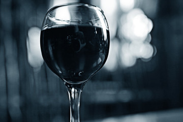 Serving a glass of red wine in a restaurant