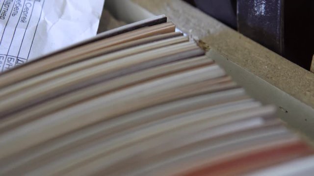 Furniture accessories. Multi Colored bobbins of PVC edge and melanin for the manufacture of furniture. Close-up