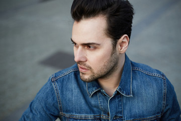 Close up portrait of young bearded man