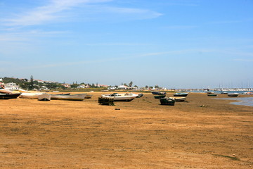 Boat an ships in a spanish beach El Rompido Huelva