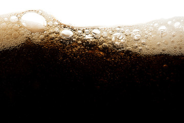 Cola soda bubble in glass on white background