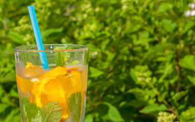 Summer refreshing iced drink with orange