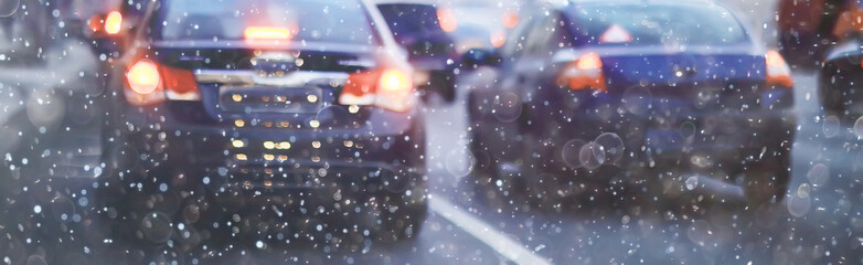 blurred transport background snow / traffic on a winter highway, seasonal auto concept, blurry auto...