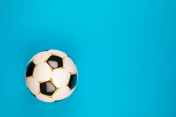 A soccer ball on blue background